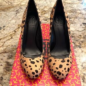 Tory Burch calf hair pumps.